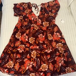 This is a beautiful dress made for any occasion. It’s brand new with tags.